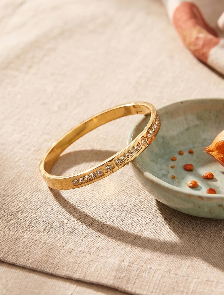 Armband versierd met witte zirkonia's. - Goud