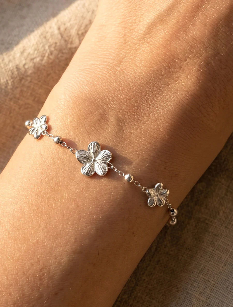 Drie-bloemen armband - Geld
