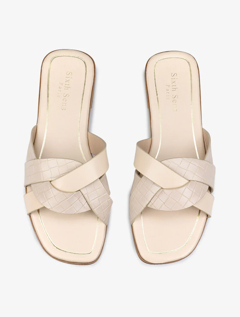 Gekruiste bandjes slippers met textuur - beige