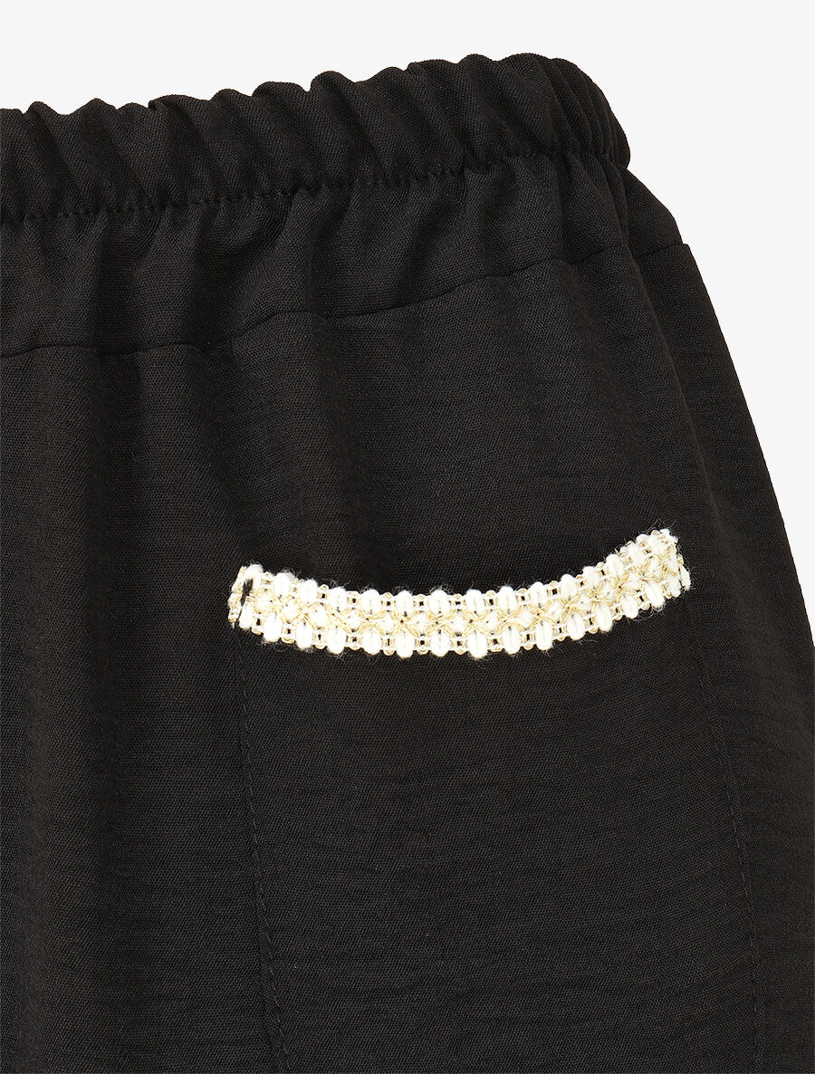 Soepele broek met stijlvolle zakken - zwart - Image 3
