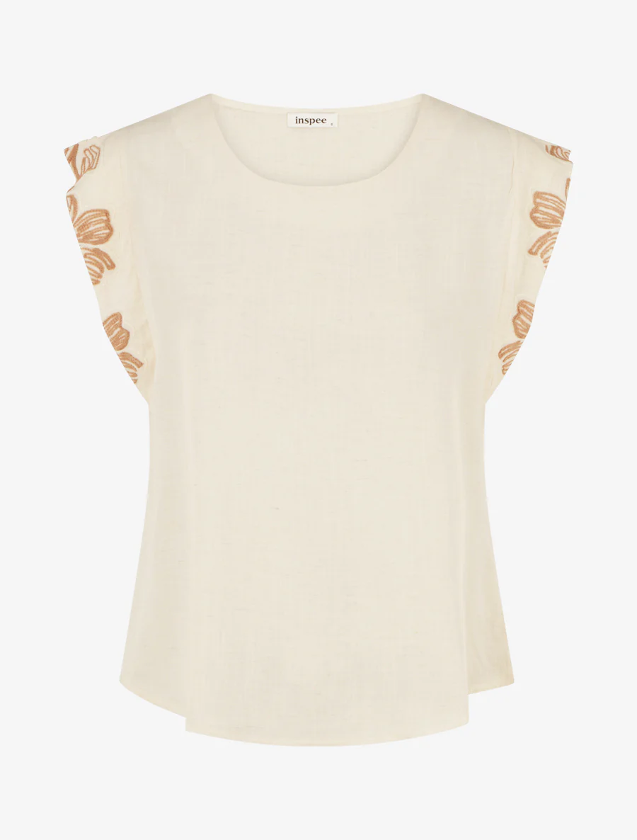 Top met geborduurde mouwtjes. - Beige