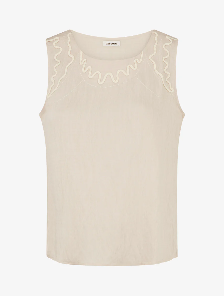 Top met golvende borduursels. - Beige