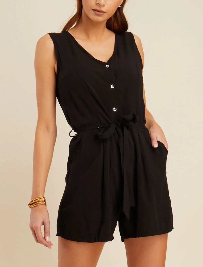 Vloeibare jumpsuit met zilveren knoopsluiting - zwart